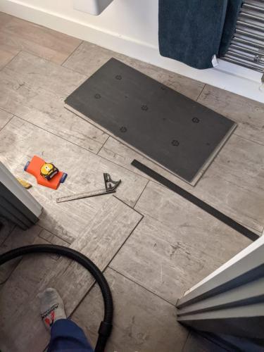 Concrete Effect Vinyl Flooring and Wood Panelled Feature Wall in Worcester