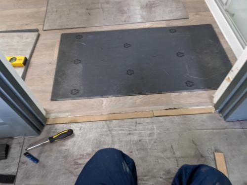 Concrete Effect Vinyl Flooring and Wood Panelled Feature Wall in Worcester