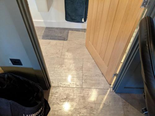 Concrete Effect Vinyl Flooring and Wood Panelled Feature Wall in Worcester