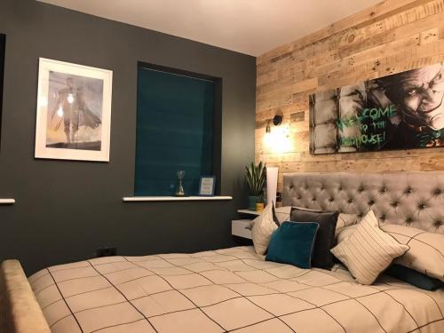 Concrete Effect Vinyl Flooring and Wood Panelled Feature Wall in Worcester