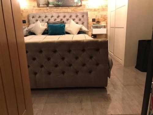 Concrete Effect Vinyl Flooring and Wood Panelled Feature Wall in Worcester