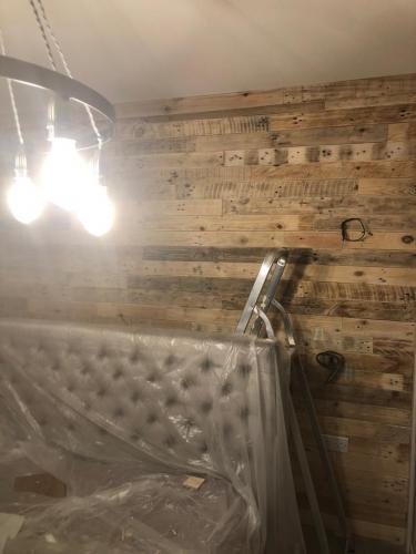 Concrete Effect Vinyl Flooring and Wood Panelled Feature Wall in Worcester